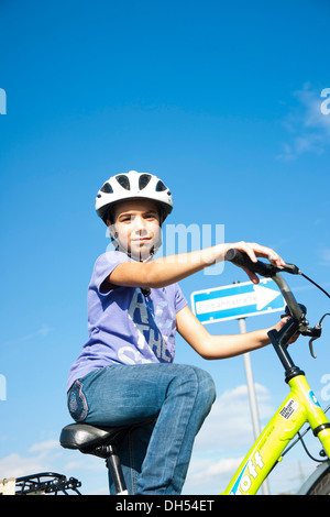 Girl wearing a bike helmet at a traffic awareness course Stock Photo