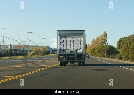 Box truck rear door vandalized with graffiti - Freemont, California USA Stock Photo