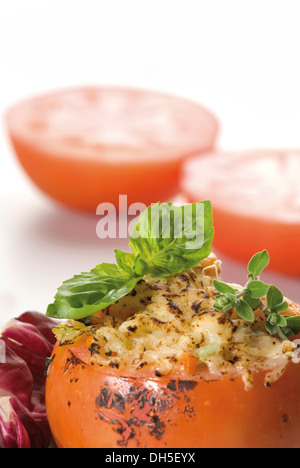 Tomatoes stuffed with rice and shrimps Stock Photo