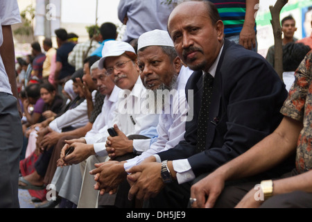 Supporters of the ruling Awami League waiting in front of Bangabandhu National Stadium for a speech by Prime Minister Sheikh Stock Photo