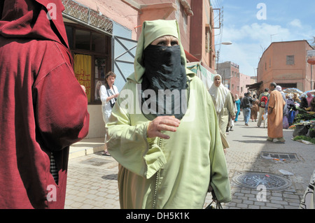 Old woman wearing a niqab veil, Fès, Morocco, Africa Stock Photo