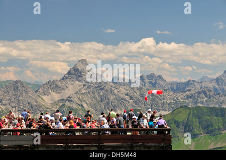 Tourists, Nebelhorn summit station, Nebelhorn mountain, 2224m, Hochvogel mountain at the back, 2592m, Allgaeu Alps, Bavaria Stock Photo