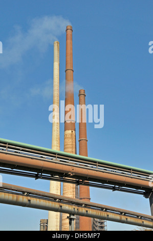 Chimneys of the Schwelgern sinter plant, at front pipes for furnace gas, coke oven gas and mixed gas, ThyssenKrupp Steel works Stock Photo