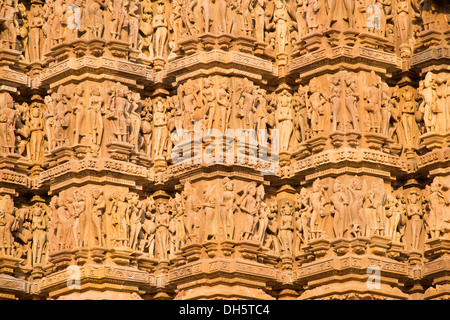 Relief sculptures of gods and men on the façade of the Lakshman Temple, Western Group, Khajuraho temple district Stock Photo