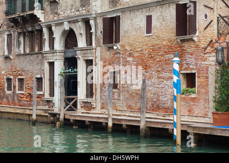 Typical street scene of canal in Venice Italy Stock Photo