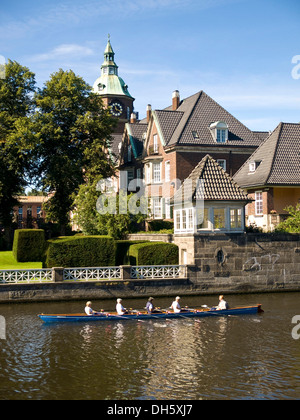 Rowing boat on the Alster in front of St. Johannis' Monastery, Hamburg Stock Photo