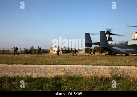 U.S. Marines with Special-Purpose Marine Air-Ground Task Force Crisis Response debark an MV-22B Osprey at Camp des Garrigues, Fr