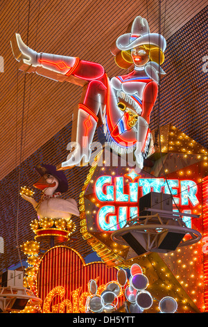 Vicky, the famous cowgirl figure from the neon sign of the Glitter Gulch Casino Hotel, Fremont Street Experience in old Las Stock Photo