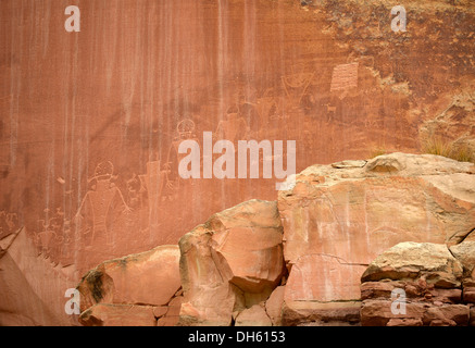 Petroglyphs etched in sandstone, symbols, mural paintings, depicting Fremont, Anasazi, Navajo and Anglo-Saxon cultures, Stock Photo