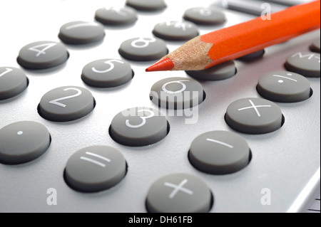 financial calculation with red pencil Stock Photo