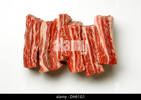 Uncooked beef short ribs on a white background. Stock Photo