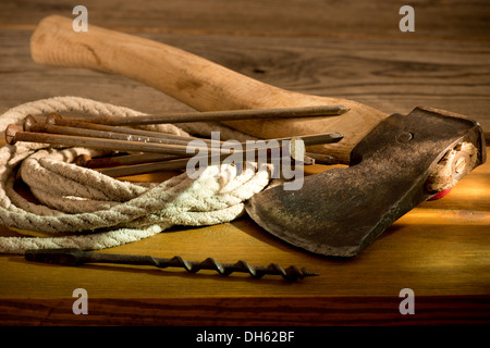 still life with a hatchet and old tools Stock Photo