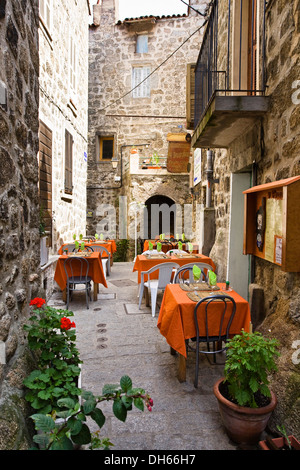 Restaurant in narrow street, Sartene, Corsica, France, Europe Stock Photo