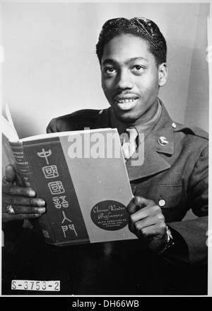 Pvt. Lloyd A. Taylor, 21-year-old transportation dispatcher at Mitchel Field, New York City, who knows Latin, Greek, Sp 535873 Stock Photo