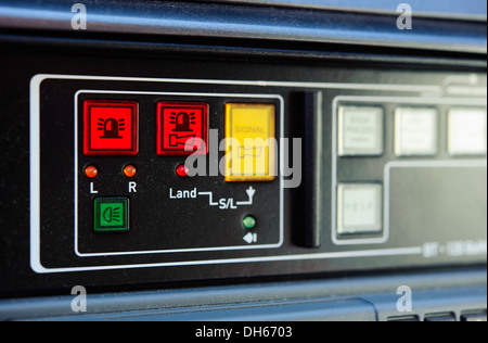 Close-up of the panel on the dashboard of a police vehicle with switches for siren or siren, flashing lights or special signal Stock Photo