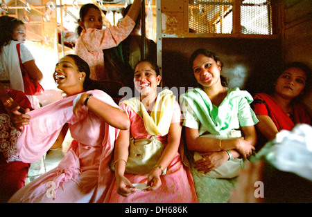 Ladies Special, train for women from the Indian Western Railway Company, befriended women celebrating joyously on the train on Stock Photo