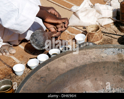 Bedouin serving Bedouin-style coffee, desert peoples from Egypt meeting in Wadi el Gamal National Park, Valley of the Camels, Stock Photo