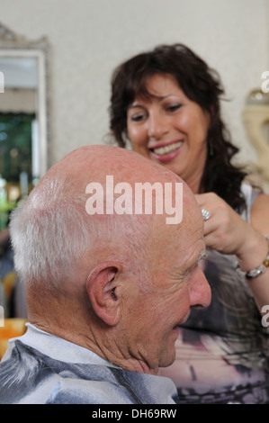 Elderly man at a hairdresser's, hair cutting, Baden-Wuerttemberg Stock Photo