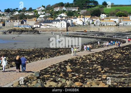 Stone Causeway at Low Tide Between St Michaels Mount and Marazion Cornwall UK. Stock Photo