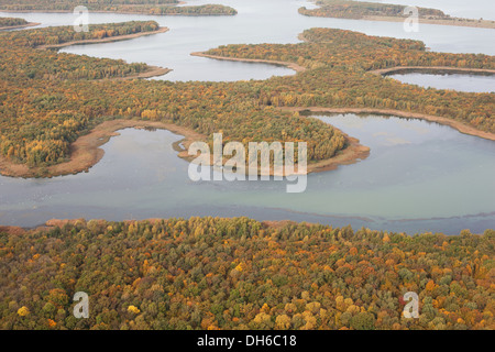 AERIAL VIEW. Curvy lakeshore of Lake Madine; a reservoir near the village of Montsec, Meuse, Lorraine, Grand Est, France. Stock Photo