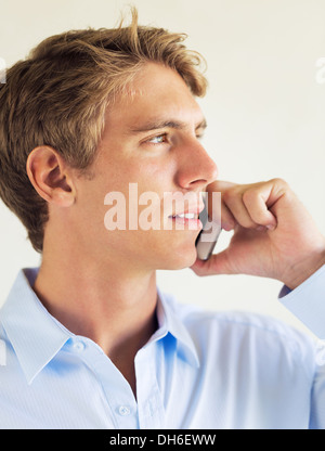 Young Professional, Handsome Man Using Smart Mobile Phone Stock Photo