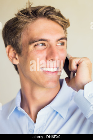 Young Professional, Handsome Man Using Smart Mobile Phone Stock Photo