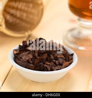 Cacao shell flakes to prepare tea, which is rich in flavonoids and antioxidants Stock Photo
