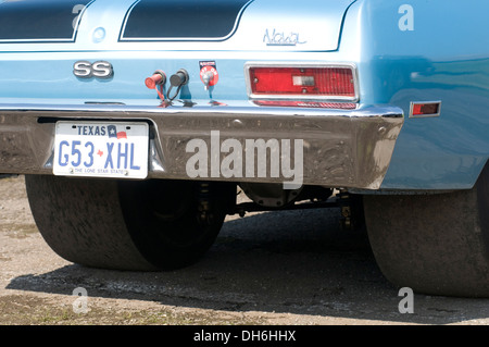 Texas license plate on chevy nova muscle car cars plates Chevrolet vehicle registration dmv department of motor Stock Photo