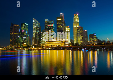 Singapore Skyline and Marina Bay after sunset. Stock Photo