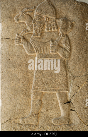 Berlin. Germany. Pergamon Museum, relief depicting a Hittite soldier carrying a ram on his shoulders Stock Photo