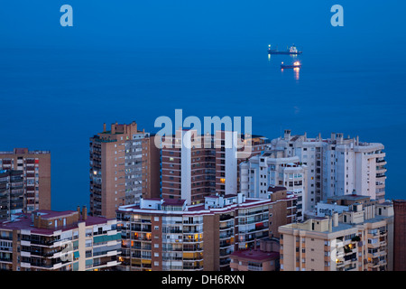 Ships in the sky in Malaga, Spain Stock Photo