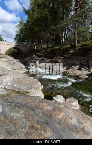 Village of Braemar, Scotland. Picturesque view of the Linn of Dee Bridge over the River Dee. Stock Photo