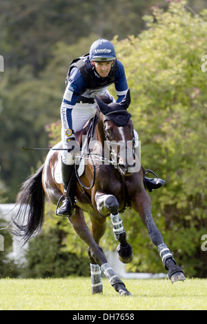 New Zealand event rider Jonathan ( Jock ) Paget and his horse Clifton Promise  taking part in the Burghley Horse trials Stock Photo