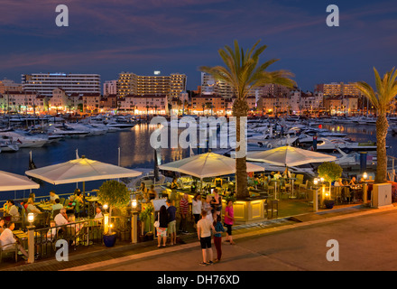 Portugal, the Algarve, Vilamoura marina restaurants at night Stock Photo