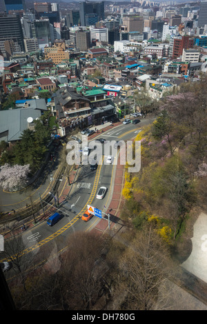 Bird's eye view of Myeongdong and the foothill of Namsan Mountain from cable car, Seoul, Korea Stock Photo