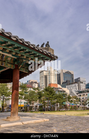 Juxtapostion of old and new architecture in Jeongneung Royal Tomb, Seoul, Korea Stock Photo
