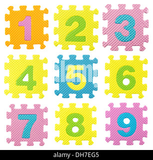 numbers from 0 to 9 created from Alphabet puzzle isloated on white background , with clipping path. Stock Photo