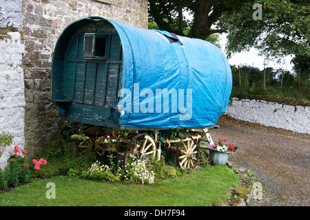 Old wooden travellers caravan in state of disrepair. Stock Photo