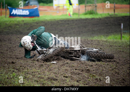 Off road motorcycle mud muddy fallen off fell over Stock Photo