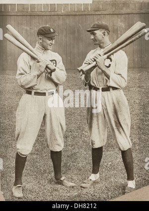 Ty Cobb, Detroit, and Joe Jackson, Cleveland, standing alongside each other, each holding bats, 1913 Stock Photo