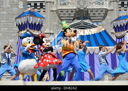 Mickey Mouse Minnie other Characters, Dream Along Show in Front of Cinderella Castle at the Magic Kingdom, Disney World, Florida Stock Photo