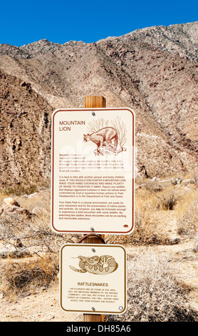 California, San Diego County, Anza-Borrego Desert State Park, Borrego Palm Canyon Trail, mountain lion rattlesnake warning sign Stock Photo