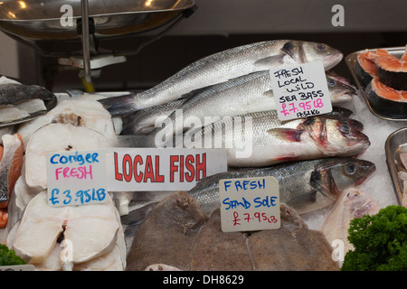 Fish Market Stall. St. Helier, Jersey, Channei Islands. England. UK. Species on offer include Conger Eel, Sole and Sea Bass. Stock Photo