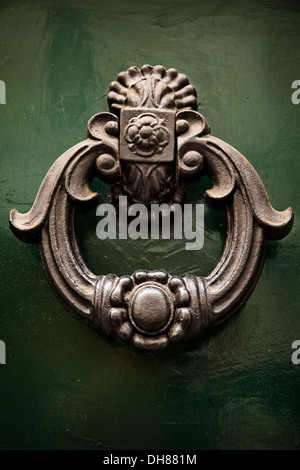 Metal antique door knocker, Rome, Italy Stock Photo