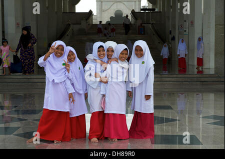 Muslim girls  schoolchildren wearing their uniforms 