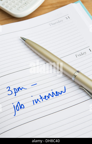 Diary With Time Of Interview Written In Stock Photo
