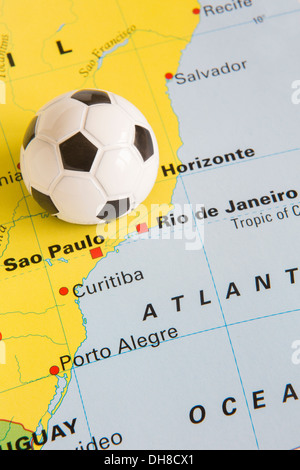 Model Football On Map Of Brazil To Illustrate 2014 World Cup Stock Photo