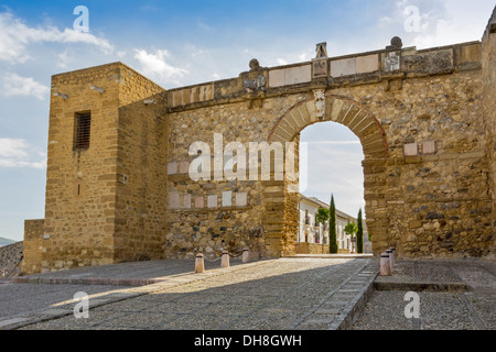 Statue of Pedro Espinosa in the Plaza de Santa Maria with a pavement cafe  and the giants arch to the rear, Antequera, Spain Stock Photo - Alamy