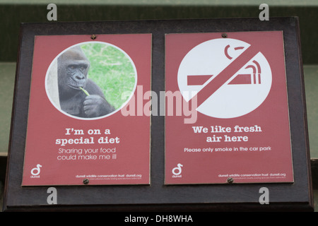 Request Signs to public visitors attending Durrell Wildlife Trust. Jersey, Channel Islands. England. UK. Stock Photo