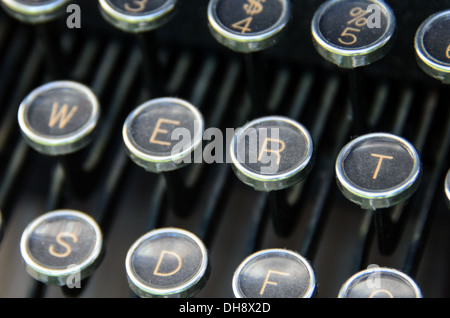 Close-up of white-on-black antique typewriter keys. Stock Photo